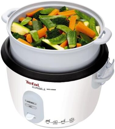 Рисоварка Tefal RK1011 Попередньо встановлені програми приготування Ємність 10 чашок (1,8 л) Ручні налаштування Ідеальне приготування рису Кошик для пароварки в комплекті 700 Вт