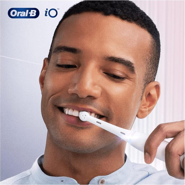 Електрична зубна щітка Oral-B iO Gentle Care, кручена та скошена щетина для більш глибокого видалення нальоту, 2 шт. и насадки для зубних щіток, біла 2 шт. и (1 упаковка)