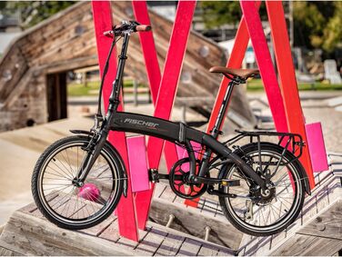 Складний електричний велосипед FISCHER e-bike FR 18 для жінок та чоловіків, висота 30 см, двигун заднього колеса 25 Нм, акумулятор 36 В в рамі, чорний матовий, 20 дюймів