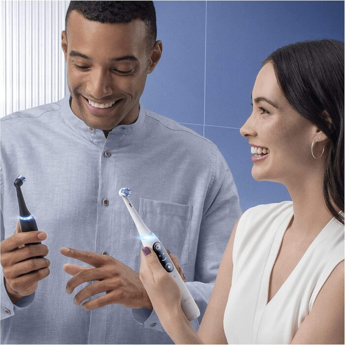 Електрична зубна щітка Oral-B iO 8 Double Pack з революційною магнітною технологією та мікровібраціями, 6 програмами чищення, кольоровим дисплеєм та дорожнім кейсом, чорний онікс/фіолетовий аметрін