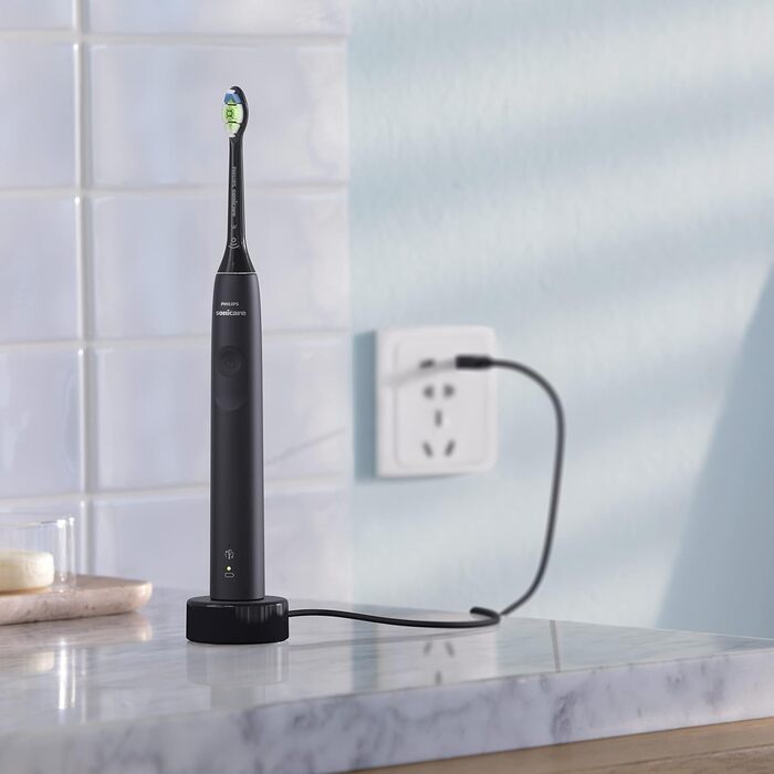 Електрична зубна щітка Philips Sonicare серії 3100 зі звуковою технологією, з датчиком тиску та індикатором заміни головки щітки, чорна (модель HX3671/14) одинарна